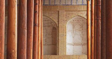 Bukhara, Uzbekistan - 4 11 2022. Passage between the columns of the ancient complex Bolo-Khauz. video