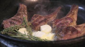 Onions are thrown to the cast iron pan fried in butter video