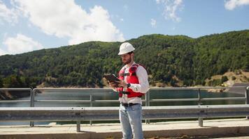 Construction Engineer Check The New Dam Building video