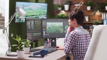 Female videographer and senior editor working on a project in post production company video