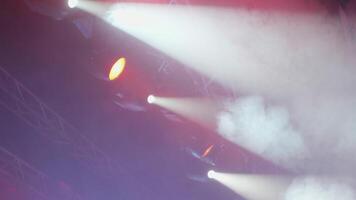 Strobe lights and smoke on the top of the stage. Lights during a music concert. video