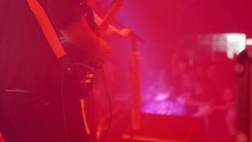 Lead guitar player on stage at a rock music event. Playing on a rock event in front of an audience. video