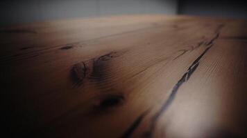 Close up of polished wooden table and the mooving light beam on its surface. Stock footage. Natural wooden texture under the light source. video