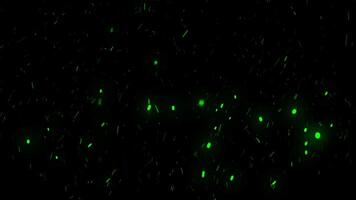 Beautiful magic sparks of green color rising up in the air. Animation. Abstract isolated glowing particles on black background flying up. video