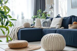 AI generated Knitted poufs near dark blue corner sofa. Scandinavian home interior design of modern living room. photo