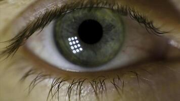 Extreme Macro of a brown eye. Video. Closeup of man's eye. spot in the eye. macro. High dynamic range and macro shot hazel eye photo