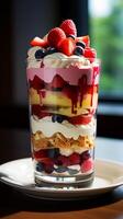 AI generated Tiramisu with fresh berries in a glass on the table. photo