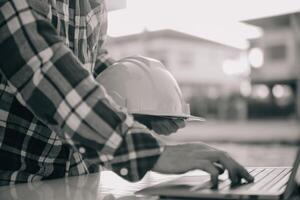 Team Construction or engineering group and worker. Teamwork and determination to succeed. Safety hard hat to prevent accident while working Transport and Container Team. Concept Restart and new Normal photo