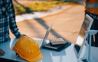 Team Construction or engineering group and worker. Teamwork and determination to succeed. Safety hard hat to prevent accident while working Transport and Container Team. Concept Restart and new Normal photo