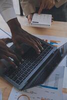 Finance manager meeting discussing company growth project success financial statistics, professional investor working start up project for strategy plan with document, laptop and digital tablet. photo