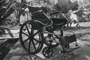 Single wheelchair parked in hospital hallway photo