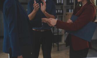 Business handshake for teamwork of business merger and acquisition,successful negotiate,hand shake,two businessman shake hand with partner to celebration partnership and business deal concept photo