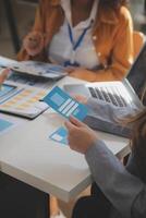 Close up ux developer and ui designer use augmented reality brainstorming about mobile app interface wireframe design on desk at modern office.Creative digital development agency photo