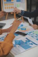 Close up ux developer and ui designer use augmented reality brainstorming about mobile app interface wireframe design on desk at modern office.Creative digital development agency photo