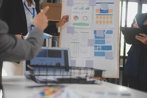 Close up ux developer and ui designer use augmented reality brainstorming about mobile app interface wireframe design on desk at modern office.Creative digital development agency photo