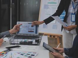 Close up ux developer and ui designer use augmented reality brainstorming about mobile app interface wireframe design on desk at modern office.Creative digital development agency photo