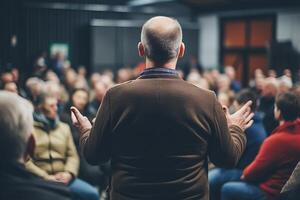 AI generated Diverse audience at conference hall, speaker delivering engaging talk at business event photo