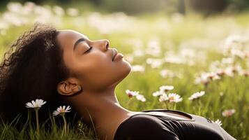 AI generated Peaceful portrait of a young African American woman lying on a grass field and smelling the aroma of a flower photo