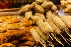 crispy fried chicken in thai food market photo