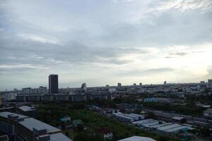 dark blue cloud with white light sky background and city light midnight evening time with dusk cloudy sky photo