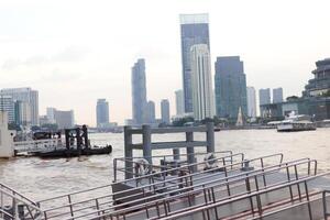 city skyline at sunset dusk Waterfront dock with dust fog photo