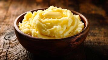 AI generated Mashed potatoes in a wooden bowl on rustic wooden background. photo