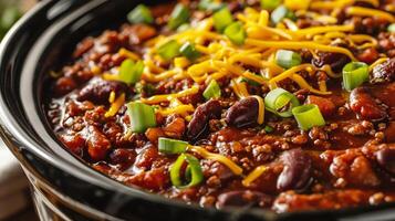 ai generado chile estafa carne en un cuenco en de madera mesa, de cerca foto