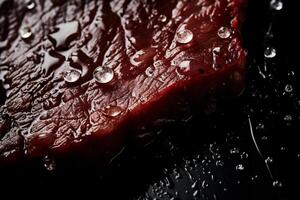 AI generated Beef steak with water drops on a black background photo