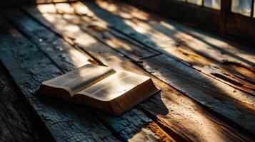 AI generated Old holy bible on a wooden table with sunlight in the background. photo