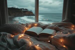 ai generado abierto libro en el cama con luces en el antecedentes de el mar. foto