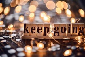 AI generated Keep Going sign on wooden blocks with bokeh lights background. photo