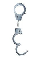 real zinc plated steel police handcuffs half-opened hanging vertically, isolated on white background photo