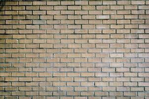 Brick wall pattern background, brick house walls texture photo