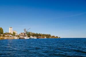 old abandoned soviet Port Balykchy on Issyk-Kul lake at sunny autumn afternoon photo