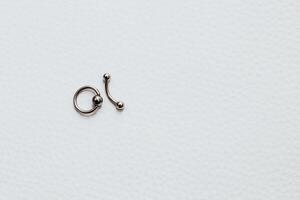 Earrings and rings made of medical steel for piercing photo