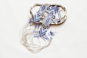 Geometric pattern on the gerdan ornament, Ukrainian beaded ornament, amulet photo