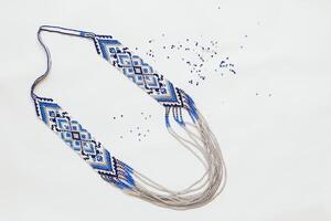 Geometric pattern on the gerdan ornament, Ukrainian beaded ornament, amulet. photo