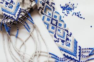 Geometric pattern on the gerdan ornament, Ukrainian beaded ornament, amulet photo