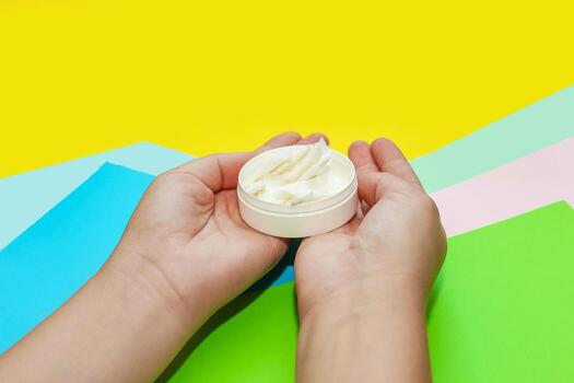 Snus pads, nicotine spiders in hands on a paper background, the concept of a harmful habit. photo