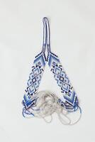 Geometric pattern on the gerdan ornament, Ukrainian beaded ornament, amulet. photo