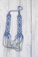 Geometric pattern on the gerdan ornament, Ukrainian beaded ornament, amulet. photo