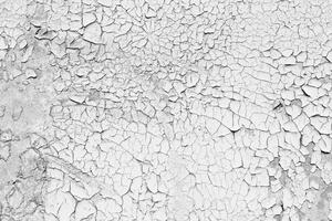 Gray texture of old cracked paint, grunge background. photo