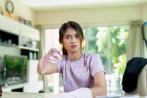 asian woman Clean on the living room, apartment or home area photo