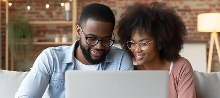 AI generated Multiracial young couple enjoying leisure time, watching laptop together on the sofa at home photo