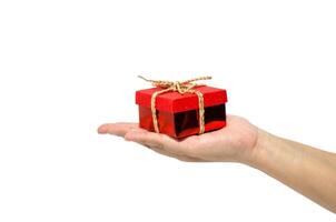 Small gift box in woman hand photo