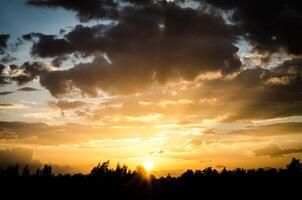 Atmospheric evening sky at sunset near the horizon look colorful. photo