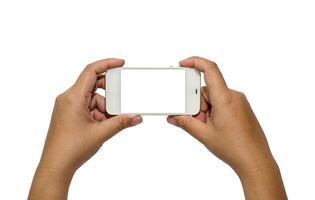 Hand holding smart phone isolated on white background photo