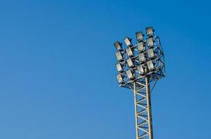 mast with spotlights sky background photo