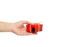 Small gift box in woman hand photo