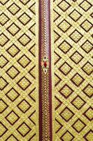 Thai pattern on door in Thailand Buddha Temple Asian style art photo